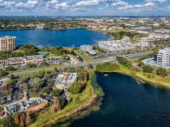 An aerial view of a city and a body of water